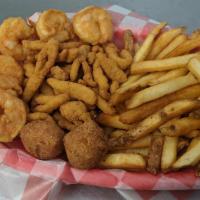 Shrimp & Clam Strip Basket · 6 jumbo shrimp and a 1/4 pound of fried clam strips with two sides of your choice and two hu...