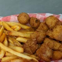 Scallop Basket · 1/2 pound of fried scallops served with two hushpuppies and two sides of your choice