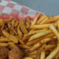Clam Strip Basket · Fried clam strips served with two hushpuppies and two sides of your choice