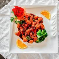 Sesame Chicken · Served with white rice. crispy chunks of chicken with sesame seed and broccoli in special sa...