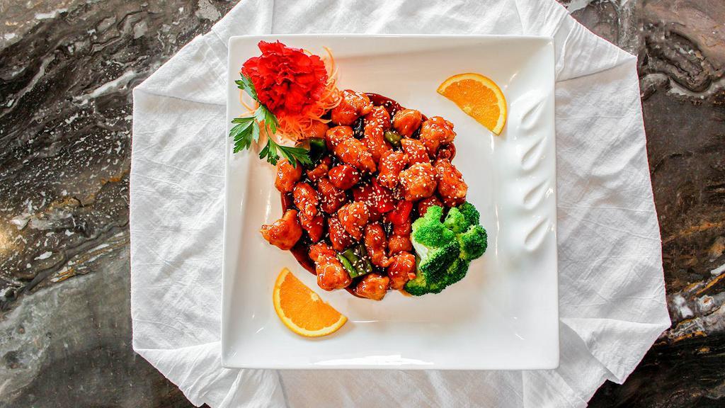 Sesame Chicken · Served with white rice. crispy chunks of chicken with sesame seed and broccoli in special sauce.