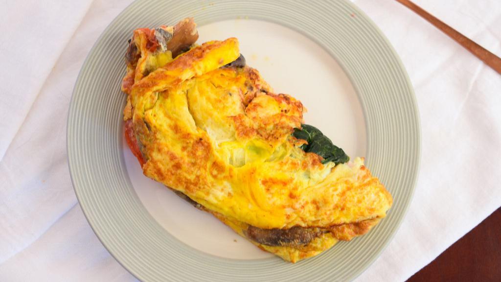 Make Your Own Omelet · Served with your choice of three toppings. Add extra toppings for $ 0.25.