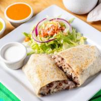 Carne Asada Burrito · Steak Burrito filled with rice, beans, Carne Asada, and melted mozzarella cheese in a large ...