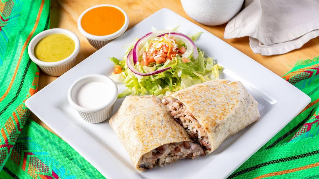 Carne Asada Burrito · Steak Burrito filled with rice, beans, Carne Asada, and melted mozzarella cheese in a large tortilla wrap!