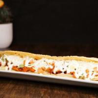 Machete · A large, footlong fried tortilla stuffed with your meat of choice, lettuce, tomato, queso fr...