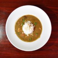 Chicken Andouille Sausage Gumbo · A classic, regional dish of rich roux, chicken and andouille sausage, served with white rice...