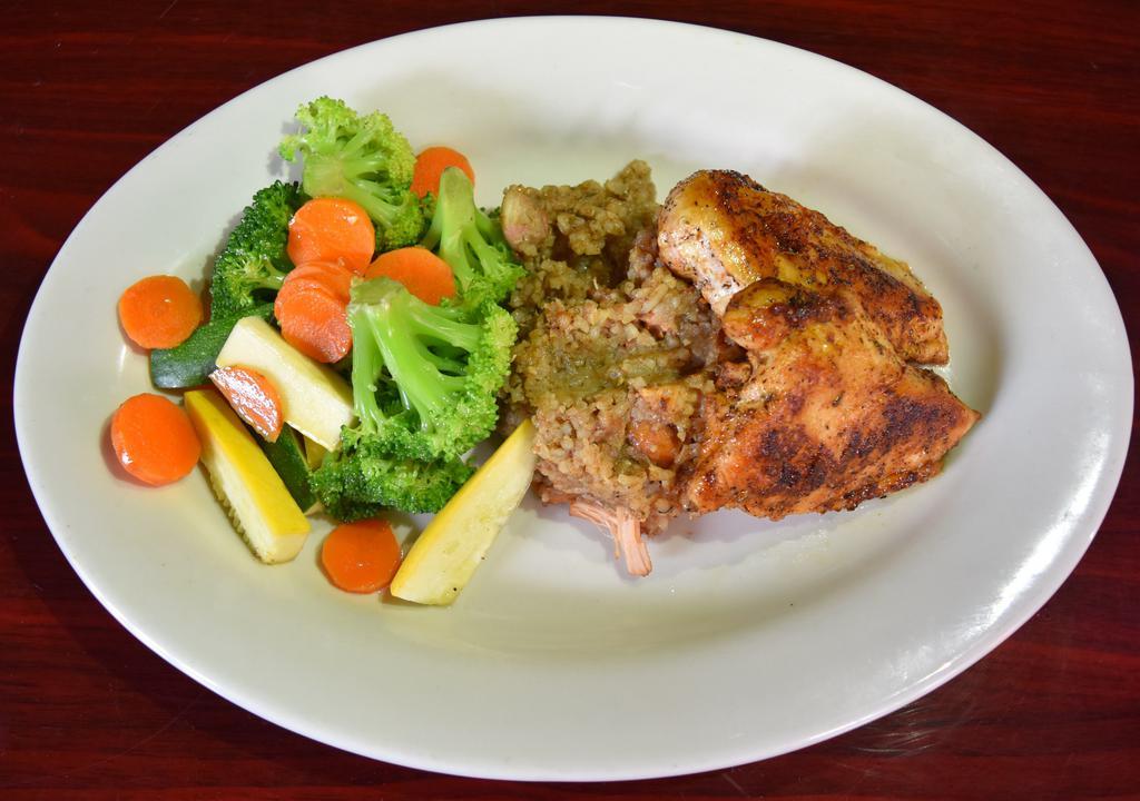Blackened Chicken · Served with seasonal steamed vegetables and chicken and andouille sausage Jambalaya.