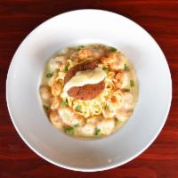 Crabcake And Gulf Shrimp Alfredo · Crab cake on top of a bed of linguine pasta with sautéed Gulf shrimp tossed with seafood Alf...
