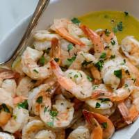 Garlic Shrimp · Jumbo shrimp cook to perfection, tossed with our garlic, lemon, caper brine sauce topped wit...