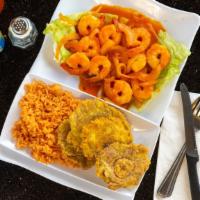 Camarones Al Mojo De Ajo · Shrimp cooked with exquisite garlic sauce, rice and beans with cheese and three flour tortil...