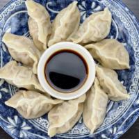 Pork & Chives Dumplings · Moist, juicy dumplings. Freshly made they are a staple homestyle food. Chinese dumplings, al...