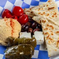 Go Big Or Go Homer · Scoop of Hummus served with Toasted Pita Points, Stuffed Grape Leaves, Kalamata Olives, Pepp...