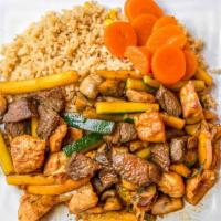 Steak & Chicken Hibachi · Grilled with zucchini and mushroom in a ginger soy sauce. Served over Japanese fried rice an...