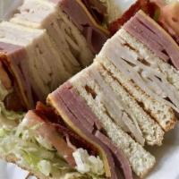 Club Sandwich · Comes with bacon, turkey, ham, and your choice of American or White cheese.
