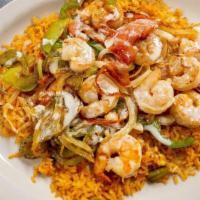 Rancho Quetzal Shrimp · A bed of rice topped with grilled shrimp, grilled bell pepper, onion, tomato. Covered with c...