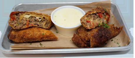 Philly Spring Rolls · Seasoned beef, peppers, onions, with queso fondue.