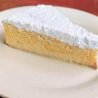 Tres Leches · Moist Spanish style cake, dipped in 3 flavorful cremes.