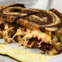 The Brooklyn Dodger · The classic reuben: corned beef chopped with sauerkraut, covered in melted swiss and russian...