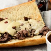 The Yankee Clipper · Hot, seasoned roast beef and melted swiss on a toasted hero, served with a side of brown au ...
