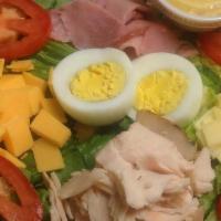 Chef Salad · Boar's head black forest ham, ovengold turkey breast, American and swiss cheese with roma to...