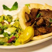 Gyro Salad · Greek salad served with a buttery pita bread & your choice of meat ( gyro meat, chicken gyro...