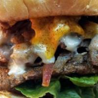 Gyro Burger · Sautéed onions over a 1/4 lb ground chuck burger with gyro meat & melted cheese. Choice of A...