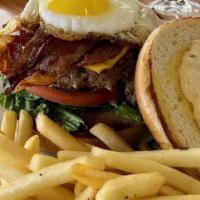 Lux Burger · 8oz fresh ground beef patty, bacon, eggs, lettuce, tomatoes, pickles, with spicy aioli on a ...