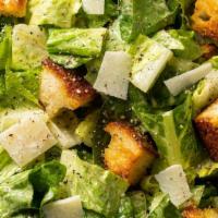 Caesar Salad · Romaine lettuce, mozzarella cheese, croutons and a side of delicious Caesar dressing.