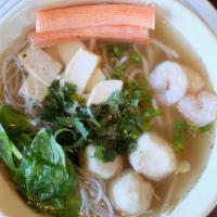 Seafood Noodle · Noodle with shrimp, fish ball, crab meat, and fish tofu in soup.