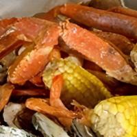 Shrimp And Snow Crab · 1/2 pound medium shrimp, and 1 cluster of snow crab served with red potatoes and corn.