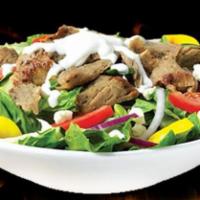 Gyro Salad · Slow roasted spiced meat served over our house salad; lettuce, tomato, onion. Served with vo...