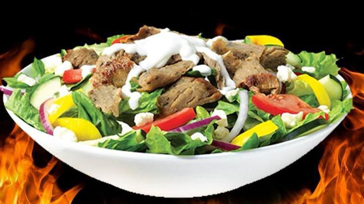 Gyro Salad · Slow roasted spiced meat served over our house salad; lettuce, tomato, onion. Served with voice of balsamic or ranch dressing.