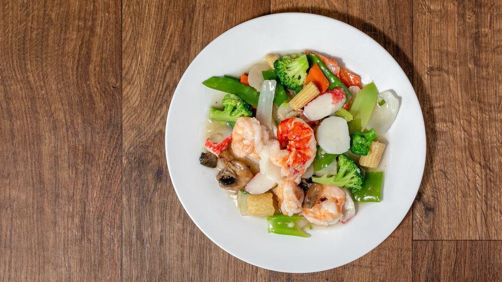 Seafood Delight · Lobster, shrimp, scallop and crabmeat with mix vegetable in our house special white sauce.