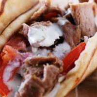 Gyros Combo  · with french fries and drink
Juicy slices of USDA choice beef, blended with spices and lamb, ...