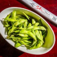 Edamame · Boiled green soy beans lightly salted.