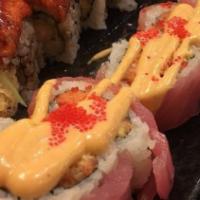 Crazy Dragon Roll · Spicy. Spicy tuna and crunch inside, outside with eel, eel sauce and fish egg on top.
