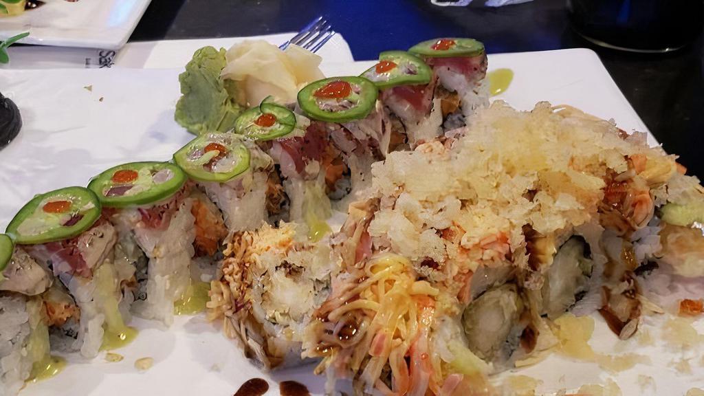 Crunchy Roll · Tempura shrimp, cucumber, avocado, oshinko and yamagobo with eel sauce.