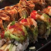 Monster Roll · Shrimp, crab meat, avocado, cucumber topped with spicy crawfish, eel sauce and rice seasoning.