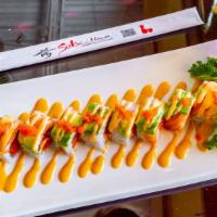 Temptation Roll · Spicy tuna and cucumber inside. Topped with yellowtail, salmon, avocado, fish egg and spicy ...