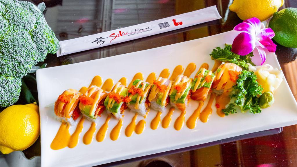 Temptation Roll · Spicy tuna and cucumber inside. Topped with yellowtail, salmon, avocado, fish egg and spicy mayo.