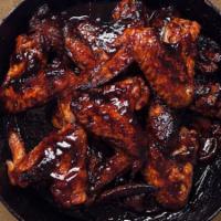 Dirty Dawg Wings - Bone-In · Classic bone-in wings oven-baked, cooked to order perfectly crisp, tossed with your choice o...