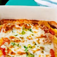 Cheese Manicotti Dinner · Pasta stuffed with ricotta cheese and basil, baked and smothered with marinara, and topped w...