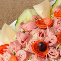 Antipasto Salad Pleasure · Our special house salad with ham, salami, and pepperoni