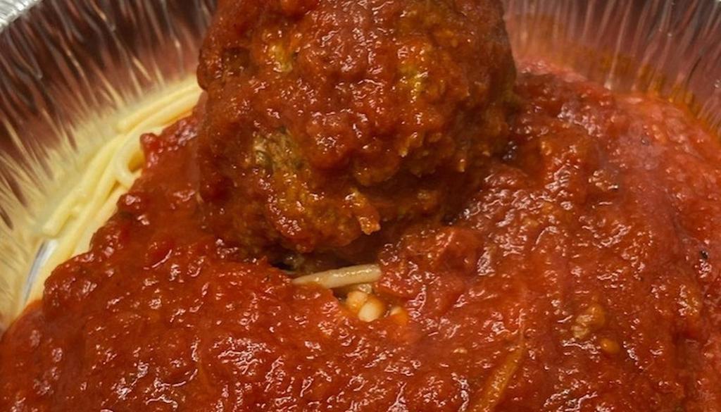 Kids Spaghetti With Meatball · spaghetti topped with 1 of our juicy homemade jumbo meatballs and our marinara sauce  served with garlic bread