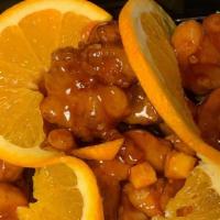 Orange Chicken · Served with fried rice and egg roll or soup or soda.
