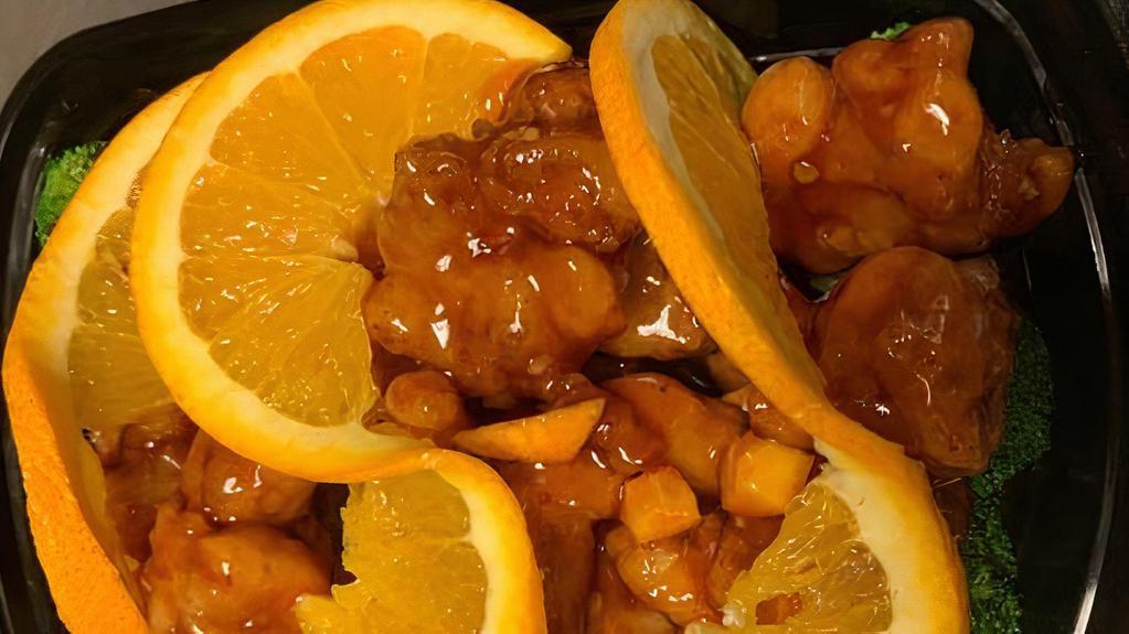 Orange Chicken · Served with fried rice and egg roll or soup or soda.