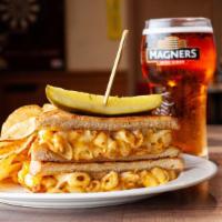 Grilled Paddy Mac & Cheese · Our paddy mac and cheese stuffed in our blend of Irish cheeses and toasted sourdough.