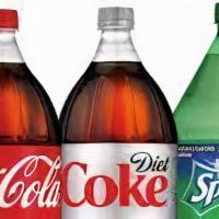 2 Liter Soda · Options: Orange, Ginger ale, Coke, Sprite