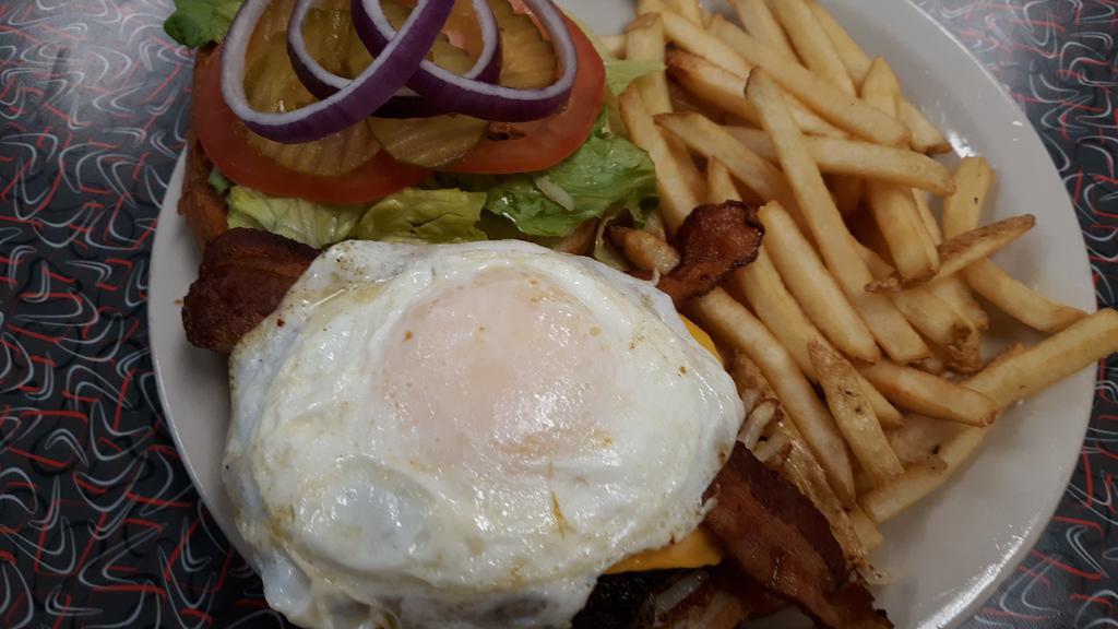 Breakfast Burger · Bacon, American cheese, and a fried egg. Served with choice of side.