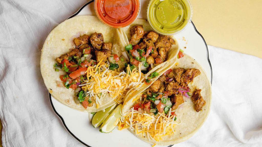 3 Soft Tacos (Corn Or Flour Tortillas) All Fillings Available · Your choice of corn or flour tortilla with cheese and pico de gallo: beef or pineapple pork or chicken or salmon or shrimp or catfish or carnitas or barbacoa.